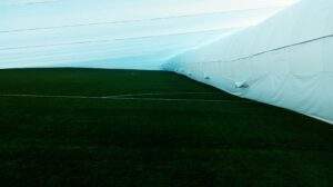 Underneath Lithuanian Football Club's macleod pitch cover